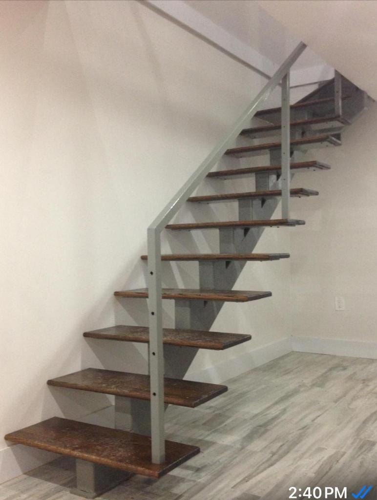 Modern floating staircase metal frame wood steps
