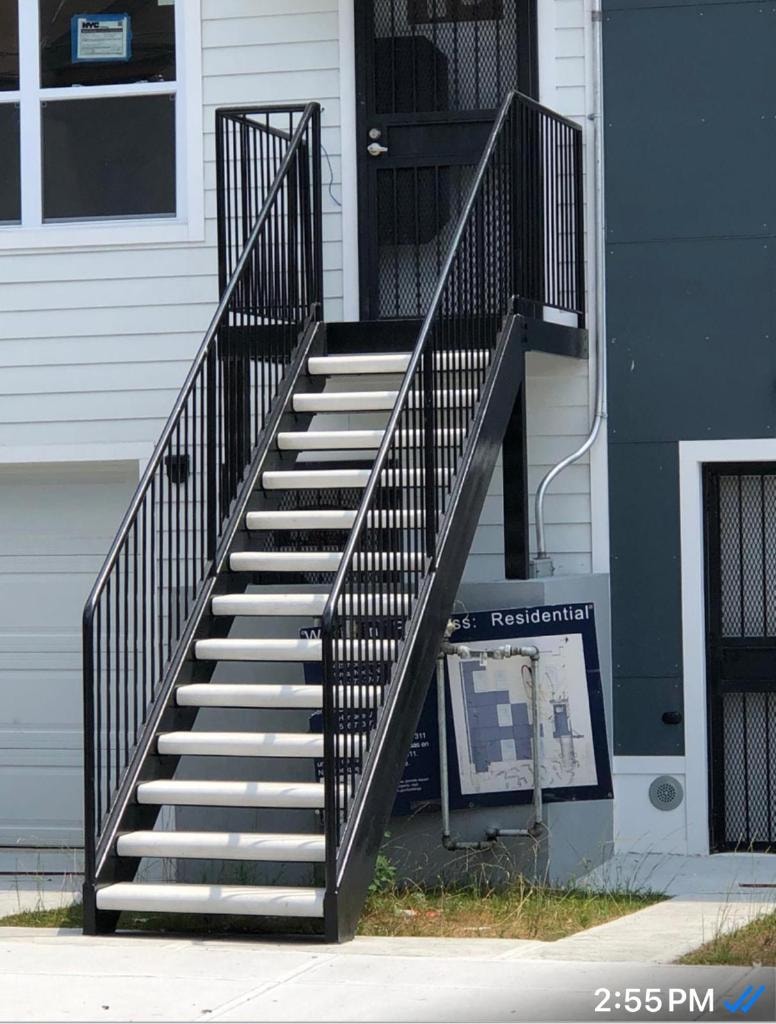 Black metal staircase residential building entrance