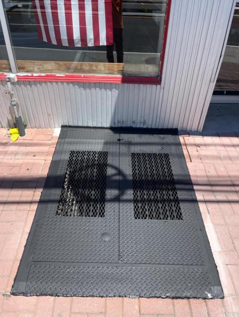 Metal loading dock door storefront entrance