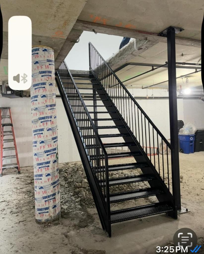 Black metal staircase under construction