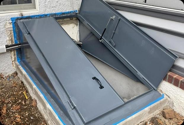 Open metal sidewalk cellar door