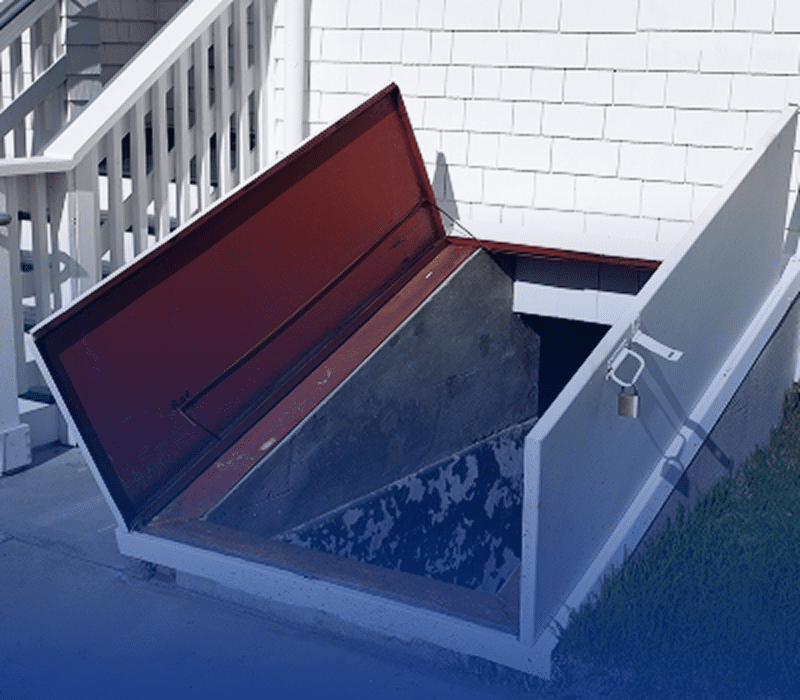 Open cellar door with stairs visible.